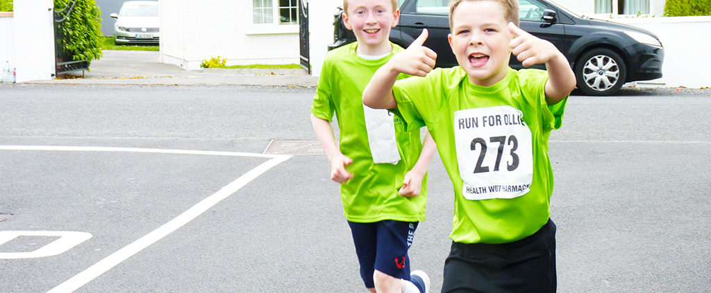 Kids running for Ollie in Milltown