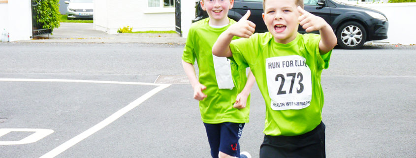 Kids running for Ollie in Milltown