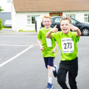 Kids running for Ollie in Milltown
