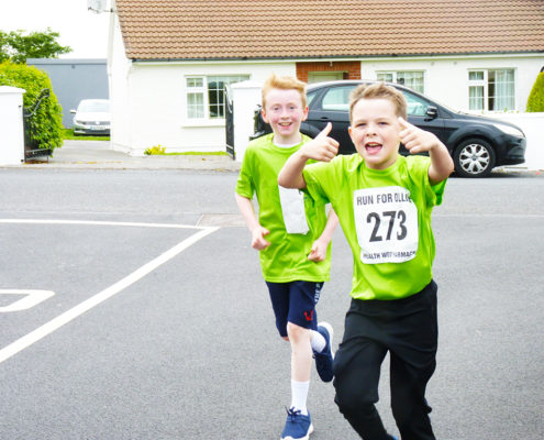 Kids running for Ollie in Milltown